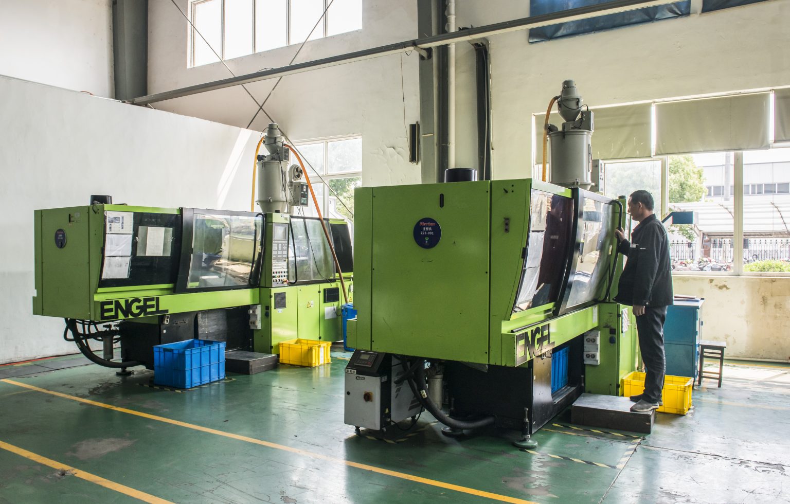 Injection molding shop with green ENGEL machines