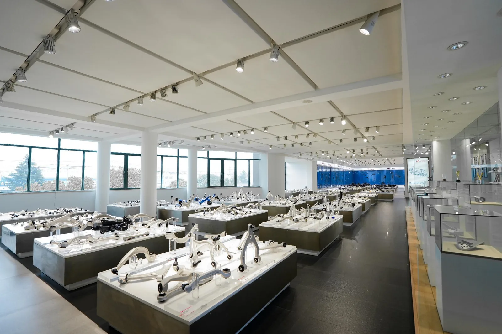 Hetian showroom with the metal company emblem and heritage exhibits