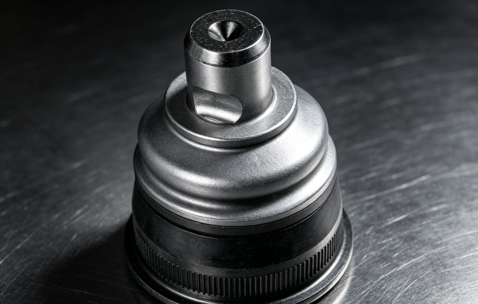 Inspecting a safety-critical suspension part for authenticity: checking part markings, packaging and build quality on a workbench